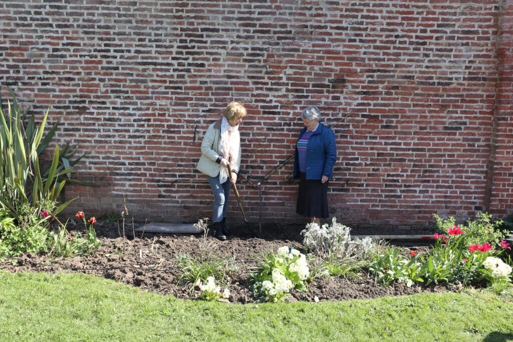 W.I. planting tree