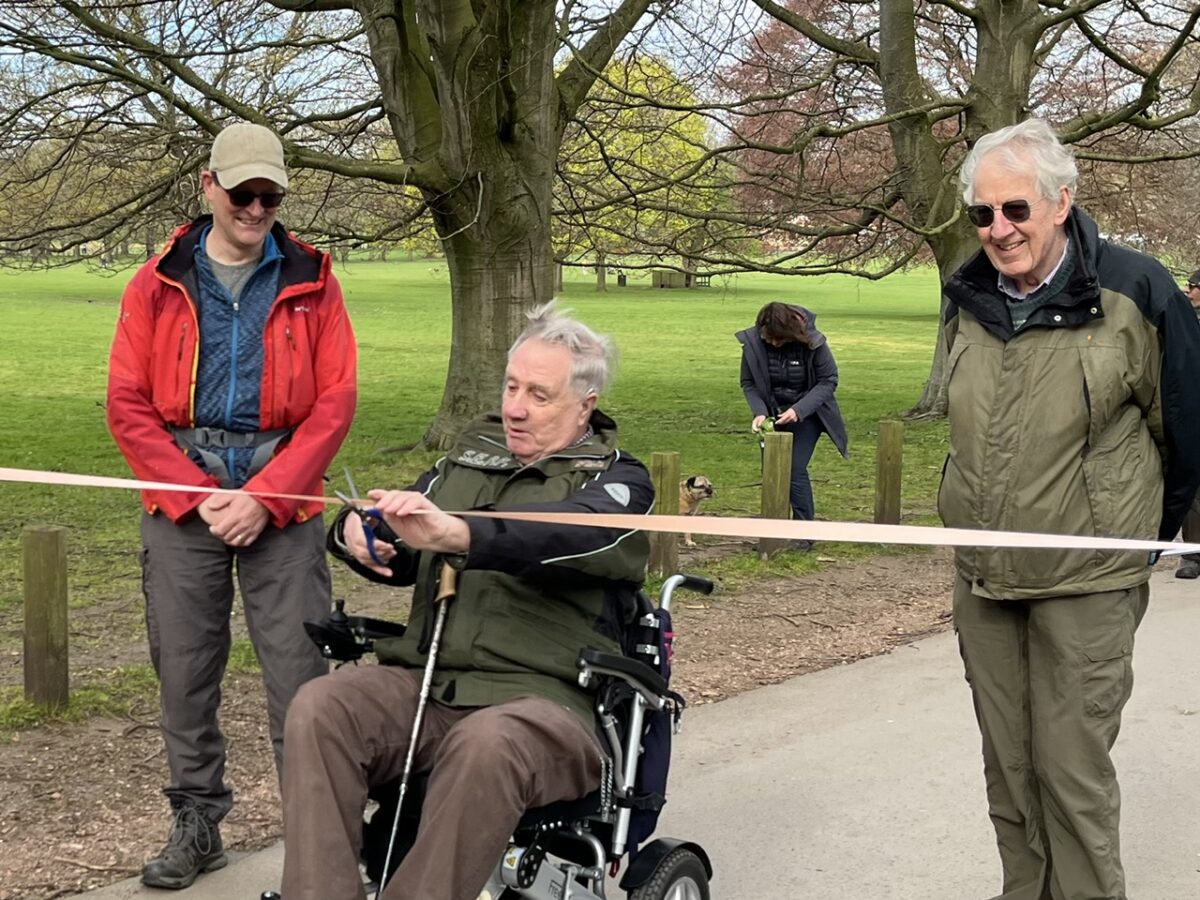 Cutting the ribbon to open the arboretum